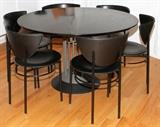 Lot#1106, ITALIAN CONTEMPORARY DINING TABLE & (6) SIDE CHAIRS, WITH ONE LEAF.Including 1 round dining table, H.29", Dia.47", with a single leaf, W.19", and a set of 6 black vinyl chairs.