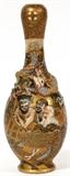 Lot#1125, JAPANESE SATSUMA EARTHENWARE VASE, MEIJI PERIOD, C. 1890, H 9", COILED DRAGON..Having a coiled dragon in high relief around neck, with finely painted gilt and enamel figures. From the Meiji Period [1868-1912]. Signed on bottom. Circa 1890.