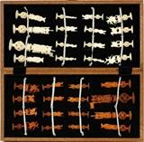 Lot#1142, CHINESE CARVED IVORY CHESS SET, 32 PIECES, H 6"Set includes a wooden case with chess board top, holding 32 carved ivory figural pieces, 16 of which are tinted, all raised on puzzle ball bases. Pieces measuring from 3 3/4" to 6".