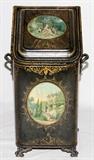 Lot#1216, ENGLISH VICTORIAN TOLE COAL SCUTTLE, MID 19TH C., H 24", W 13"Featuring a figural reserve at the hinged cover and a country estate at the front, flanked by handles.