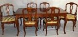 Lot#1238, BODART, FRENCH PROVINCIAL STYLE WALNUT DINING TABLE, (6) CHAIRS, BREAKFRONT & SERVER.Including 1 dining table, H.29 1/2" x 66" x 42"; 2 armchairs and 4 side chairs; 1 breakfront, H.75" x 74" x 18"; and 1 server fitted with two drawers above two cabinet doors. Nine pieces total.