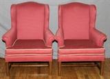Lot#1454, CHIPPENDALE STYLE UPHOLSTERED WINGBACK CHAIRS, PAIR,Salmon upholstery with beige rope form accents to the cushions. Each measures H.42" x 28" x 27".