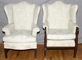 Lot#1455, CHIPPENDALE STYLE UPHOLSTERED WINGBACK CHAIRS, TWO,Each featuring ivory upholstery with floral and leaf motif. One chair has carved hand rests with reeded support accents. Measures H.45" x 27" x 27".
