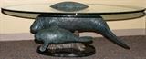 Lot#2037, ROBERT WYLAND BRONZE WITH GLASS TOP TABLE H 23" L 61" D 41", "ABOVE AND BELOW MANATEES"Robert Wyland [American B.1956] studied at the College For Creative Studies, Detroit, MI.  Edition numbered AP 6/95.  Accompanied by a Certificate of Authenticity from Wyland Galleries.