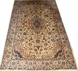 Lot#2075, NAIN, WOOL RUG, W 4'5'', L 7'5''Having a cream ground with overall multi-colored floral and leaf designs