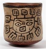 Lot#2254, SANTO DOMINGO NATIVE AMERICAN SUN/MASK DESIGN POLYCHROME POTTERY CUP H 2 1/2"Santo Domingo Native American Sun/Mask Design Polychrome pottery handless cup.