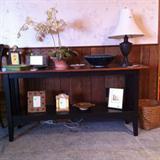 Very nice Ethan Allen sofa table. Longaberger on floor.