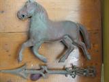 Antique weathervane parts.