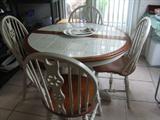 Tile top kitchen table, four chairs and two extra leaves