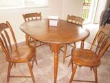 Hitchcock,  kitchen table, 4 matching chairs. 2 leaves