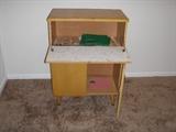 50's early 60's drop down leaf and storage on bottom great for shabby chic