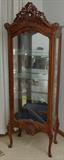 Beautiful 1930's Carved Curio.21.5 Wide,13" deep and 70" tall.3 Glass Adjustable shelves.There is Actually a Matched Pair but Will Separate.$700 each.