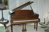 Story And Clark Baby Grand in Walnut.$1500 OBO. In Super shape.