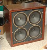 Wood Cabinet 4x12 ,Celestion Rola G12 M.Cones have old repairs and slight damage.This has a Reported connection to REO Speedwagon Guitar Player.