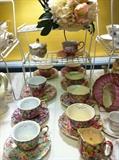 many cups & saucers
