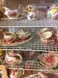 many teapots and other dishes