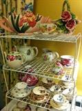 many teapots and other dishes