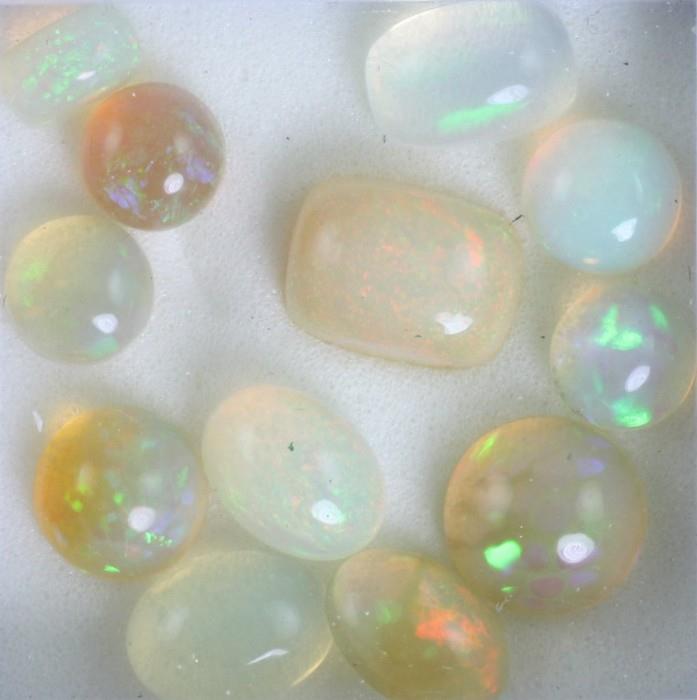 Unmounted gemstones: 6.85 ctw in opal cabochons. Let Jewelry Exchange & Auction help you find a setting & create the jewelry you want while saving you up to 70% off jewelry store prices!
