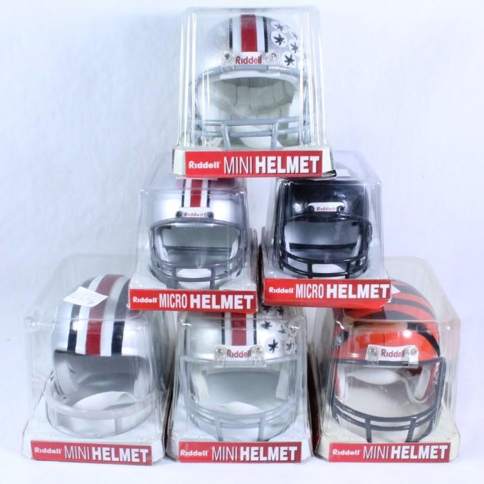 TIMES THE MONEY: Lot of 6 Riddell mini & micro football helmets in original boxes. Two helmets are signed. Please preview for details. Times the money: bid per piece.
