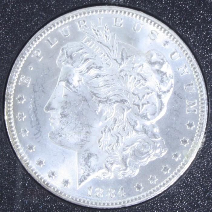 Certified 1884-CC U.S. Morgan silver dollar certified & graded UNCIRCULATED by GSA (U.S. Government General Services Administration), with original GSA box & certificate of authenticity