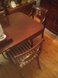 Duncan Phyfe mahogany table, pads, leaf and 6 upholstered chairs