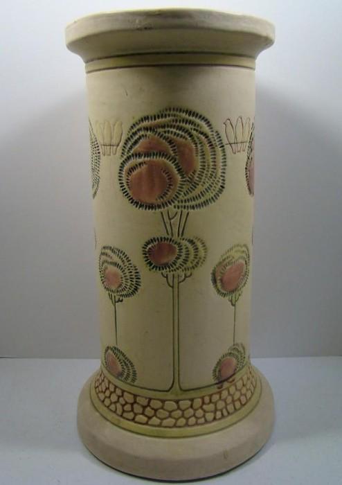 Weller Flemish Pedestal. Marked with impressed Weller. This style of Flemish by Weller is perhaps the rarest of its design with the three bird design and impressed geometric patterns that make up the trees. Has a chip on the edge of its platform and a small chip on its body which can easily be repaired. There is also a horizontal crack near its base. (see photos) Measures 29"h. x 11"w.
