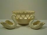 Lennox Gold Rimmed Bowl and Matching Swan Figurines. Bowl measures 3"h. and swans 5.5"w. All are in Good Condition. 
