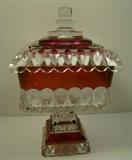 Ruby Flash Covered Candy Dish. Marked WC. Measures 8"h. and has a chip on its corner. 
