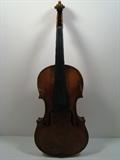 Antique Stainer Violin. At one time this was a very high quality violin and is still considered worth restoring. Please see photos for condition. Measures 24"h. x 8.5"w. 