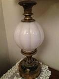 Close-Up of Milk Glass and Brass Lamp