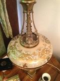 Close Up of Ornate Glass and Brass Painted Lamp