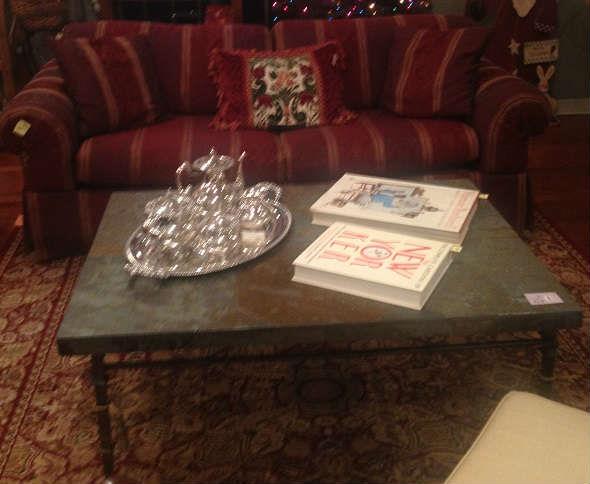 Slate coffee table with silverplate tea service.