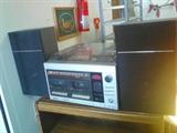 AM/FM Stereo w/ record player, dual tape decks & two speakers