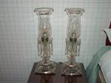 Part of etched crystal lamps (one shade has damage).