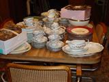 Table full of dinnerware.