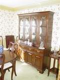 Ethan Allen cherry china cabinet part of 9-piece dining room suite.