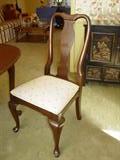 One of six Ethan Allen cherry dining room chairs. This is part of the 9-piece dining room suite we are selling.