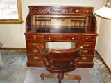 Ethan Allen pine rolltop desk & chair.