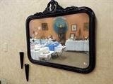 Rectangle antique mirror painted black.