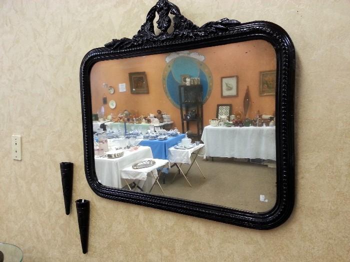 Rectangle antique mirror painted black.