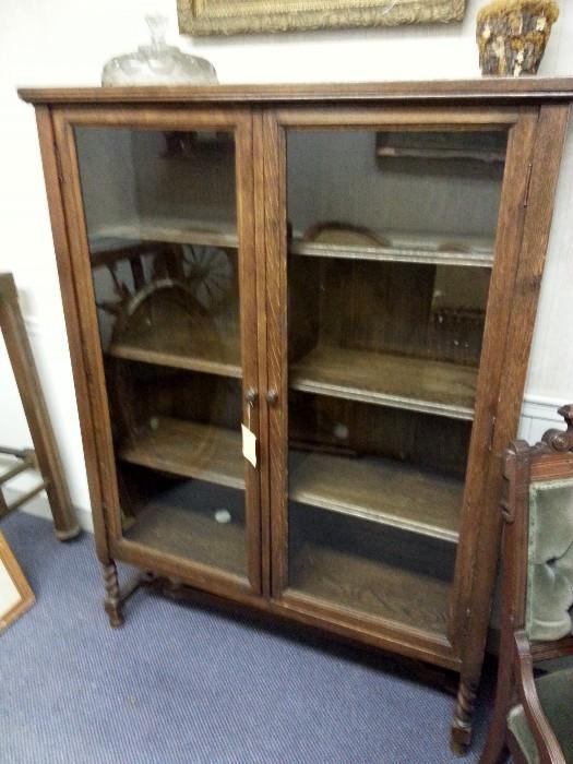 Antique Glassfront China Cabinet with Barley Twist Legs.  In excellent conditon.