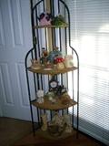 Corner wicker shelf.  Knick knacks