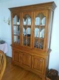 Solid oak china hutch with light.
