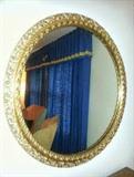 Gold leaf,ornate, round mirror