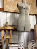 Vintage dress form with cast iron legs