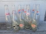 vintage Coke and Pepsi glass bottles