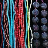 hand-carved Agate stones and strands of beads