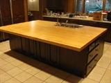 Massive kitchen butcher block top island-- approx. 6' x 9'