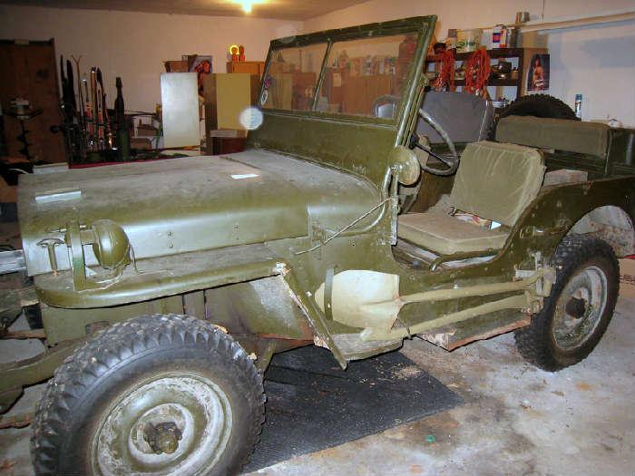 1945 Willys Jeep with vin number. Has soom accessories attached. Seats look original