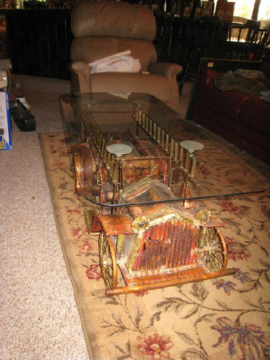 Fire Engine Coffee Table- Made from musical instruments, toilet parts, copper and brass